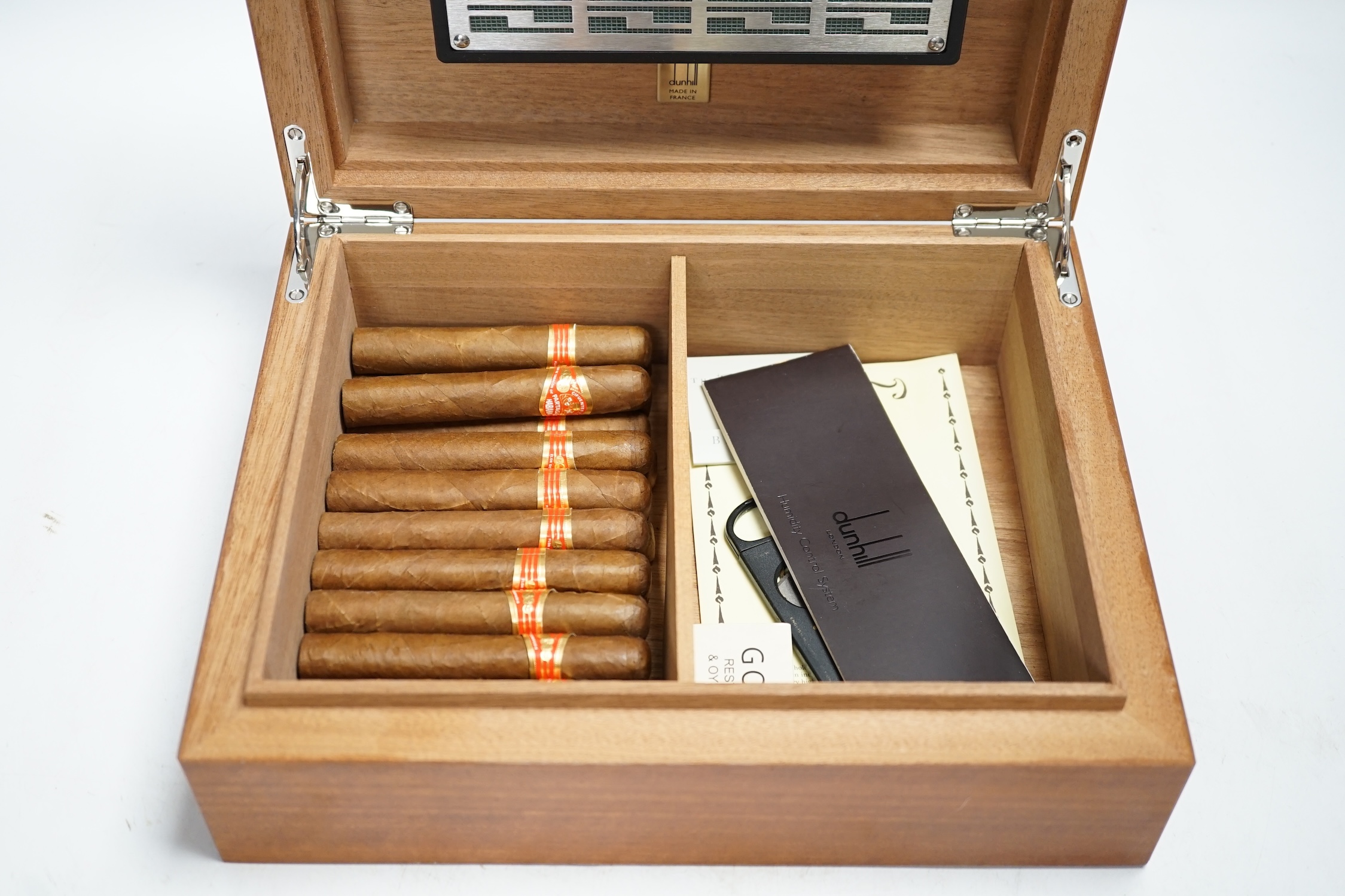 An Alfred Dunhill humidor containing partagas cigars, cutter etc., case 28cm wide. Condition - fair to good